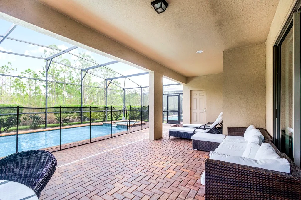 Covered lanai overlooking the private pool at Nice Palms