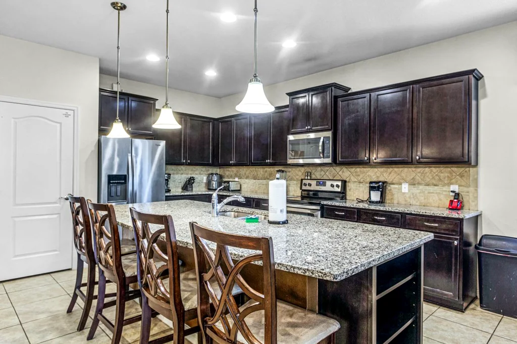 Kitchen island and dining at Nice Palms